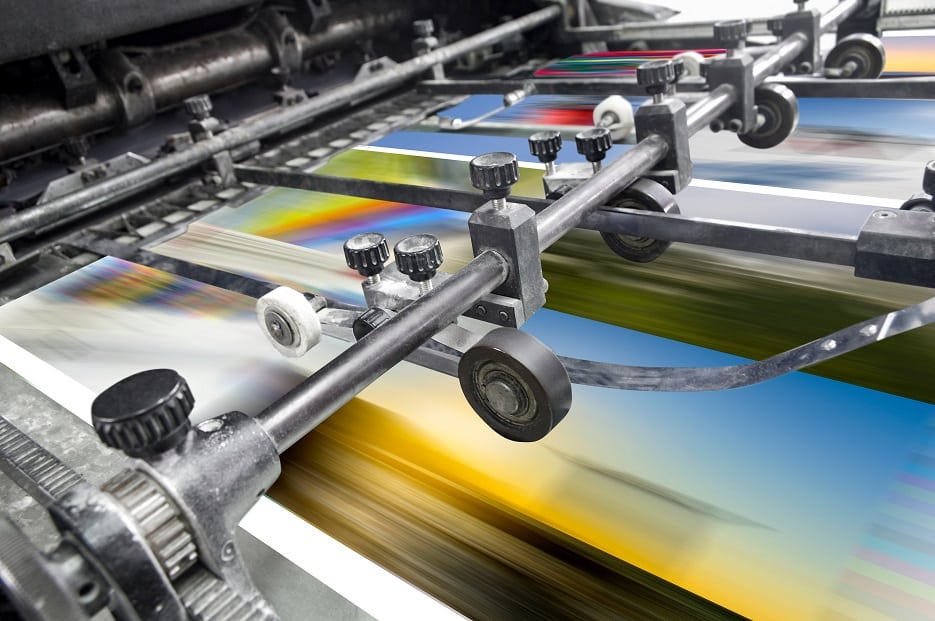 Business offset printing machinery in action
