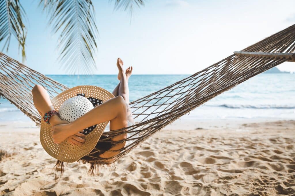 Woman enjoying summer sun and summer marketing strategies